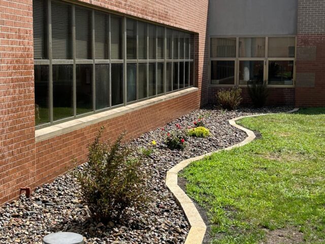 river rock and border landscaping