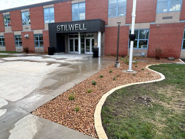 Landscape rock with brick stone trim